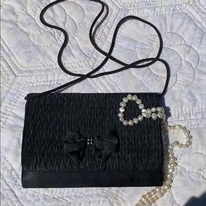Black satin evening bag